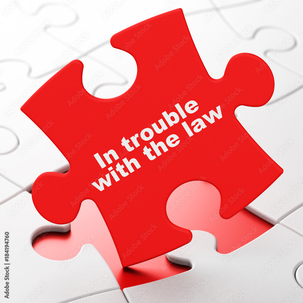 Law concept: In trouble With The law on Red puzzle pieces background, 3D rendering Law concept: In trouble With The law on Red puzzle pieces background, 3D rendering