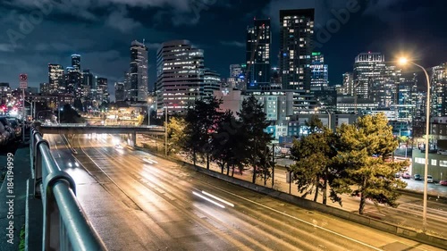 Epic Night Time-Lapse Downtown Seattle Freeway and Skyscraper Buildings photo