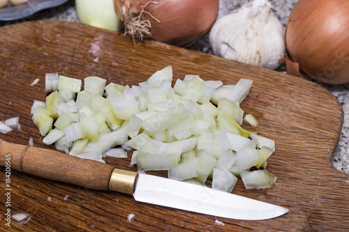 chopped onion for cooking in the wood table
