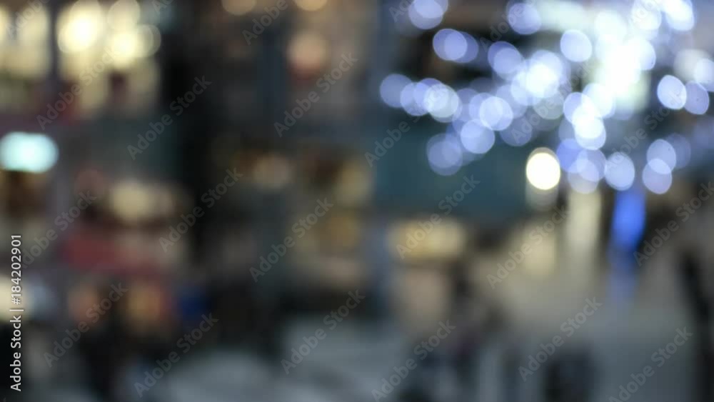 Defocused shopping mall with large number of people walking and moving time lapse Defocused shopping mall with large number of people walking and moving time lapse
