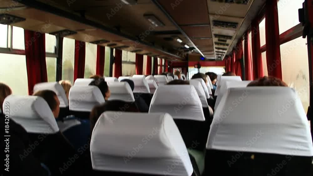 passengers sit and ride inside the bus
passengers sit and ride inside the bus