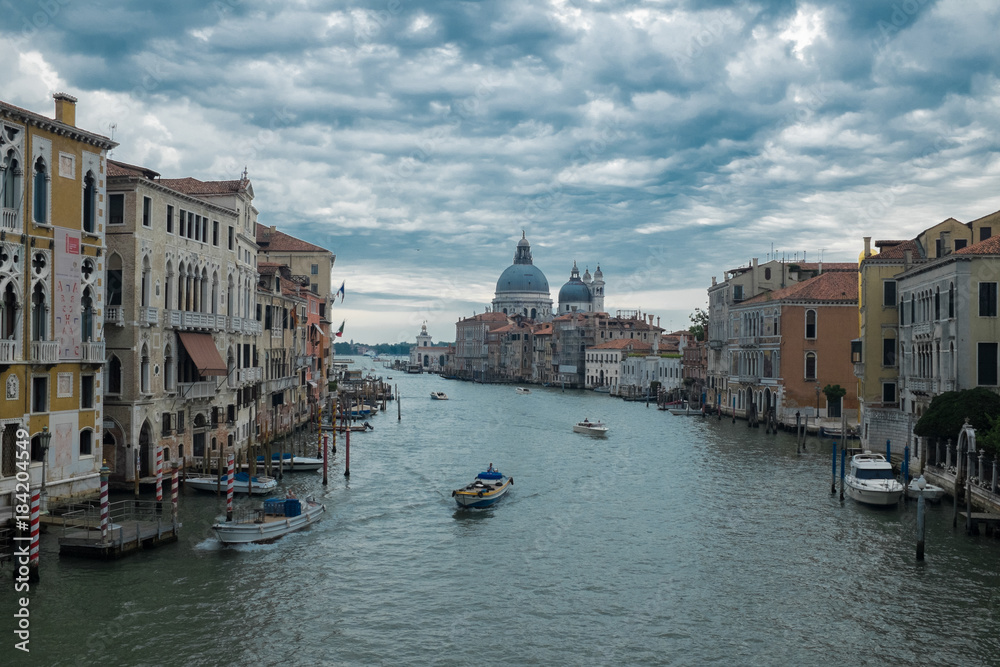 Canals of Venice, view of Santa Maria della Salute, Italy. Romantic travel photo background