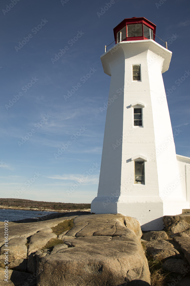 Peggys Cove Lighthouse, Nova Scotia, Canada on rocky shoreline