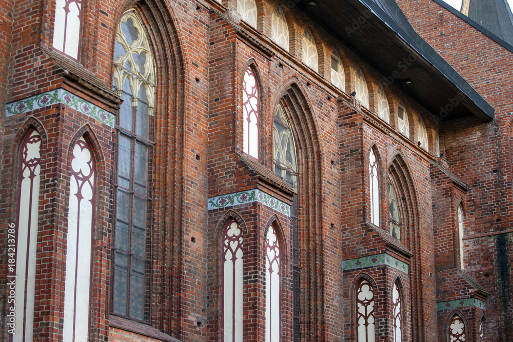 Medieval Gothic Windows in a Brick Wall