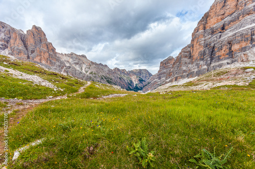 View of wild Travenanzes valley with Vallon Bianco and Furcia Rossa Mounts background, Dolomites, Italy photo