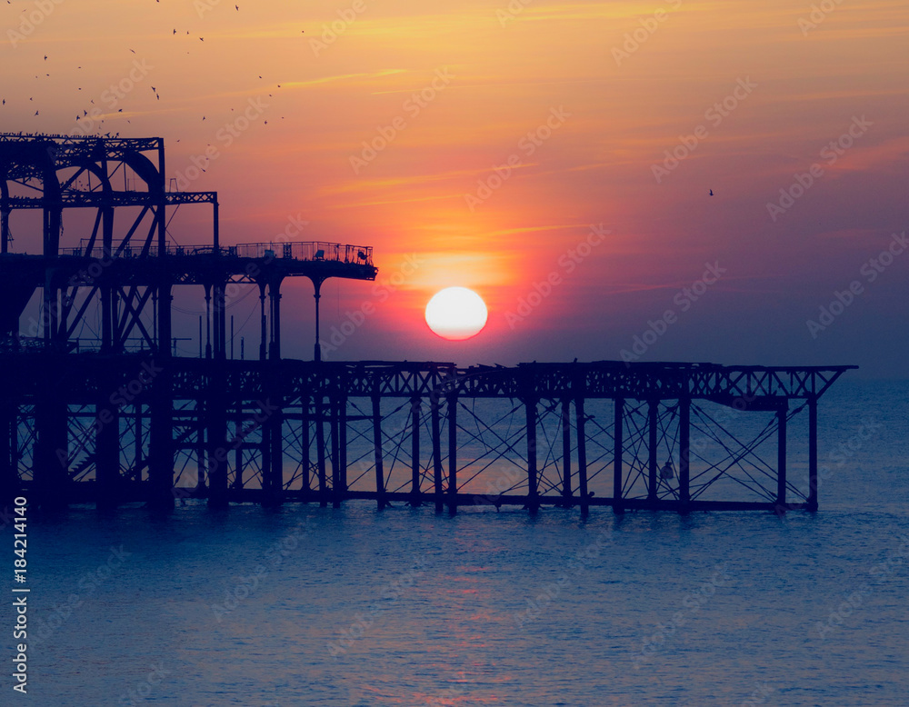 sunset over the old pier