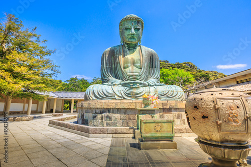Kotokuin Temple, Kamakura in Kanto region, Japan. The temple is famous for Great Buddha or Daibutsu, a monumental bronze statue of Amida Buddha, one of the most famous icons of Japan. photo