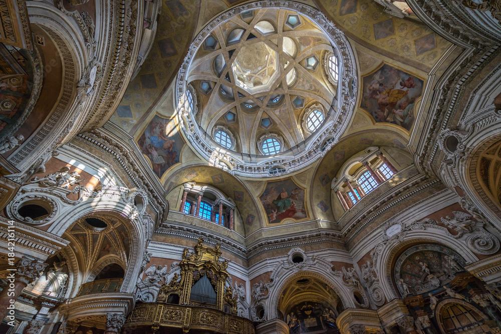 Decorated baroque interior of church of San Lorenzo, designed and built by Guarino Guarini, Turin, Italy