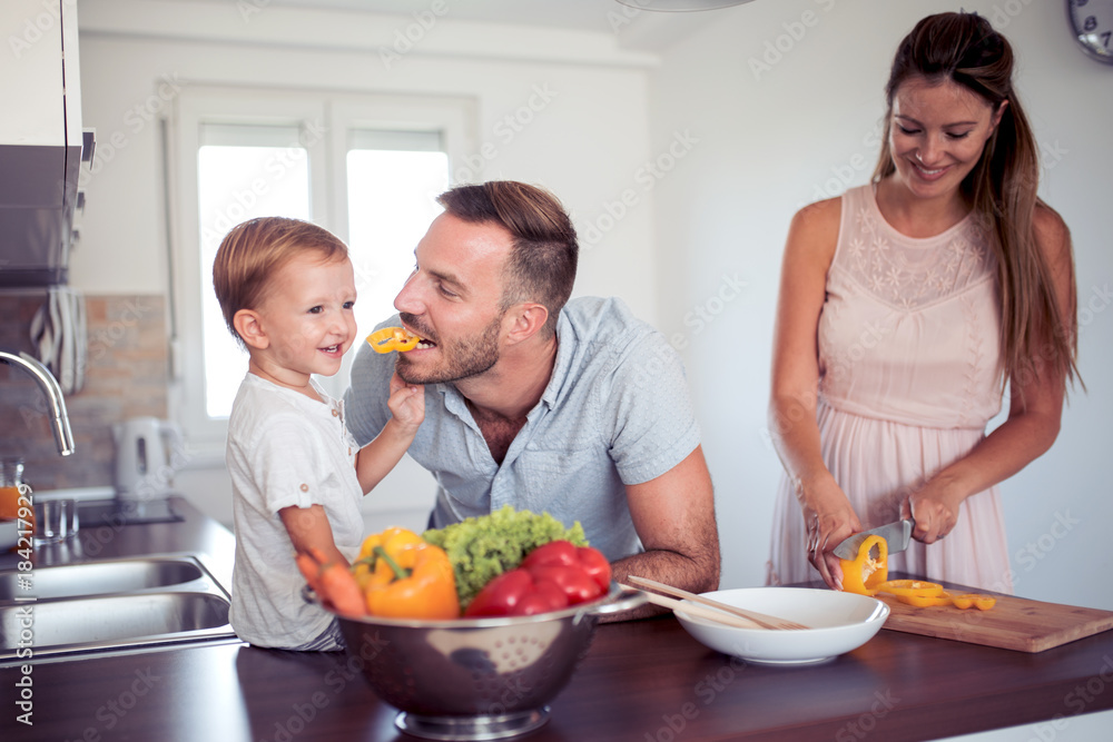 Happy family in the kitchen.