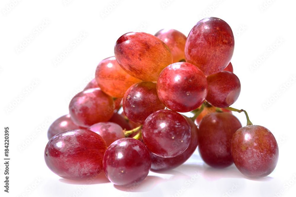 Red grapes on white