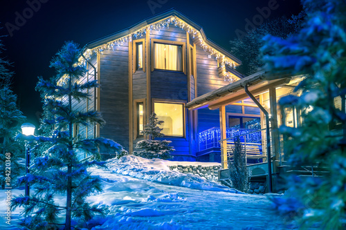 Two storey cottage in winte...