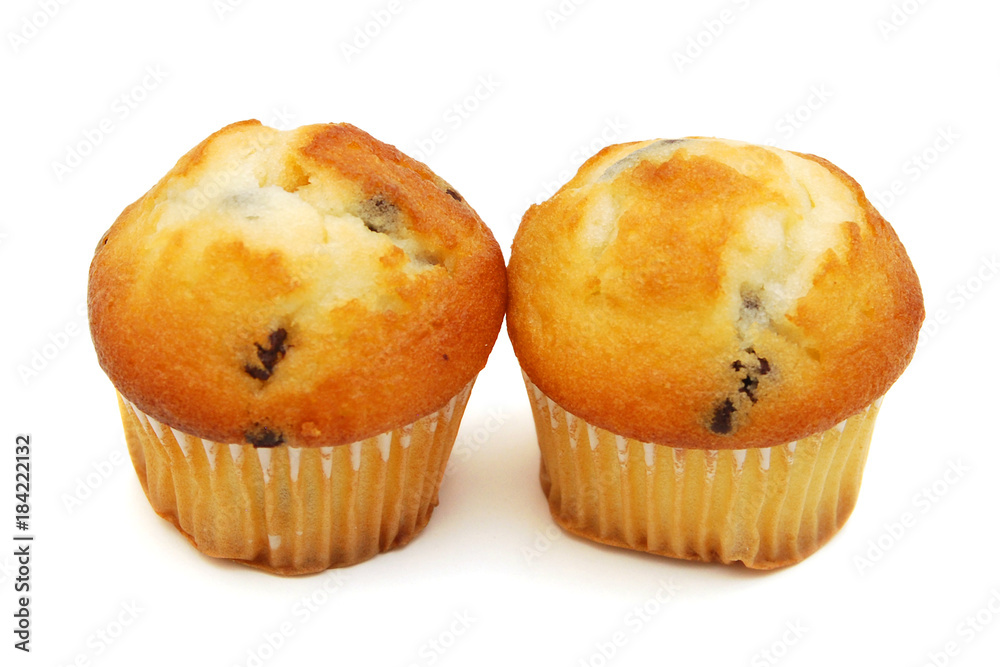 Two cupcakes mixtures over white background. Two cupcakes mixtures over white background.