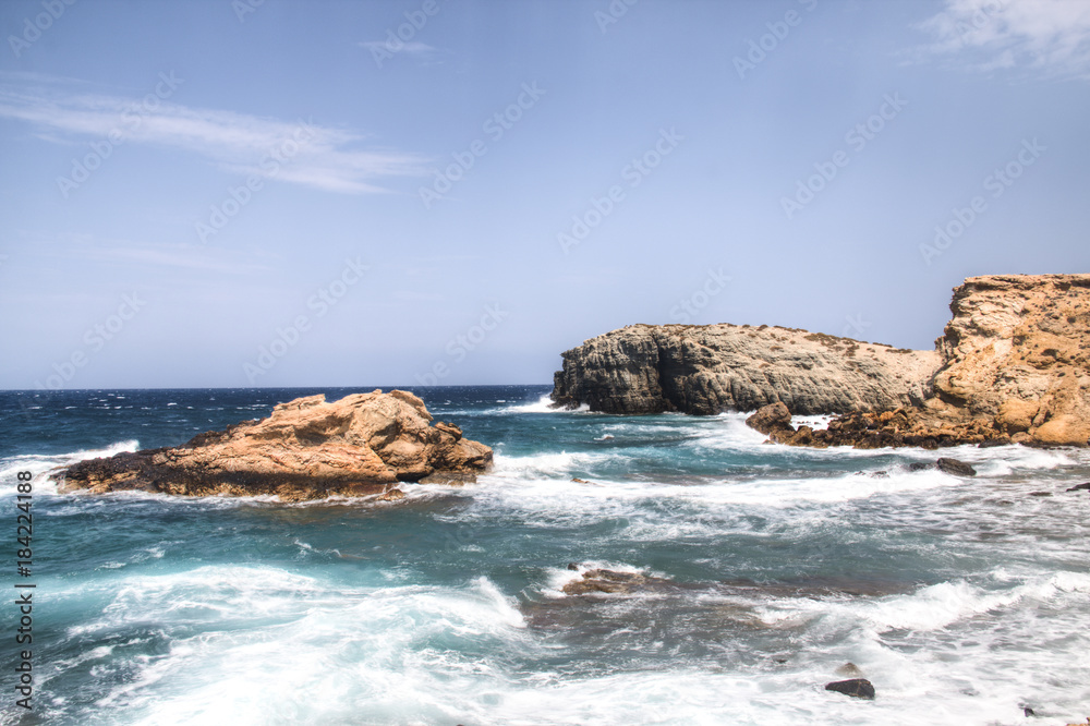 The coastline with rocks on Antiparos, one of the Cyclade islands in Greece
The coastline with rocks on Antiparos, one of the Cyclade islands in Greece