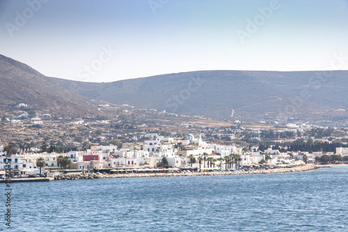 View over a bay with a typical village on Paros, one of the Cyclade islands in Greece 