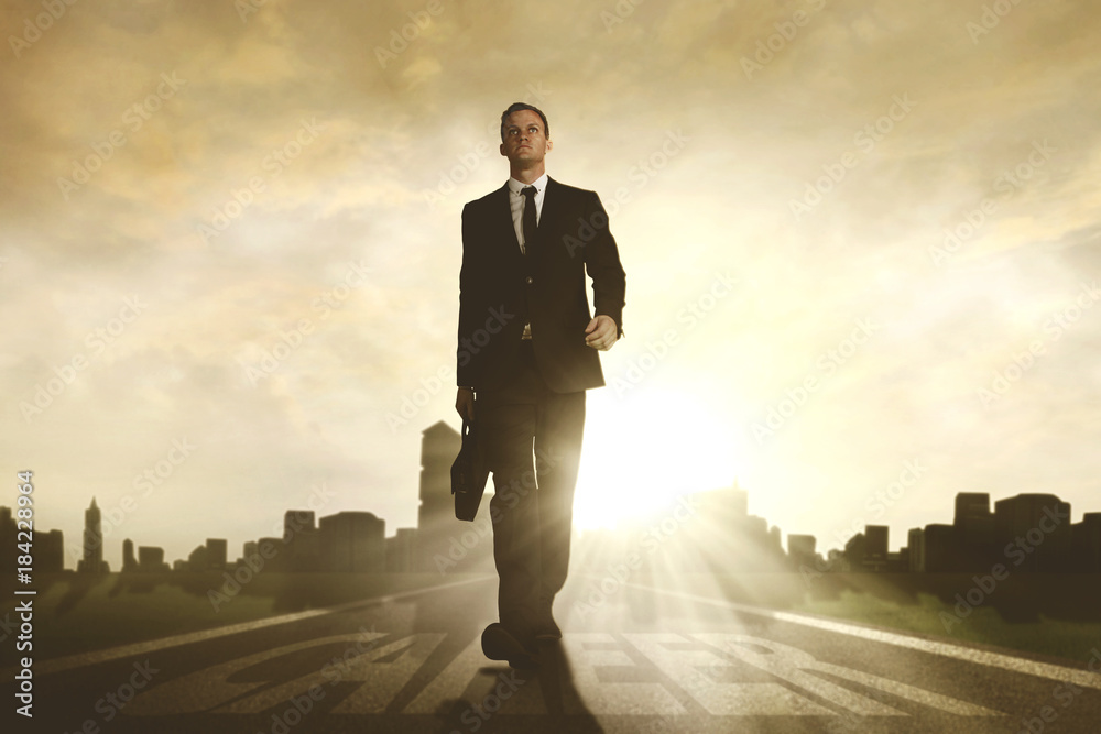 American businessman walking above career word