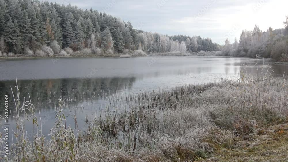 October morning frost on the Mill pond. The village Bugrovo, Pushkinskie Gory October morning frost on the Mill pond. The village Bugrovo, Pushkinskie Gory
