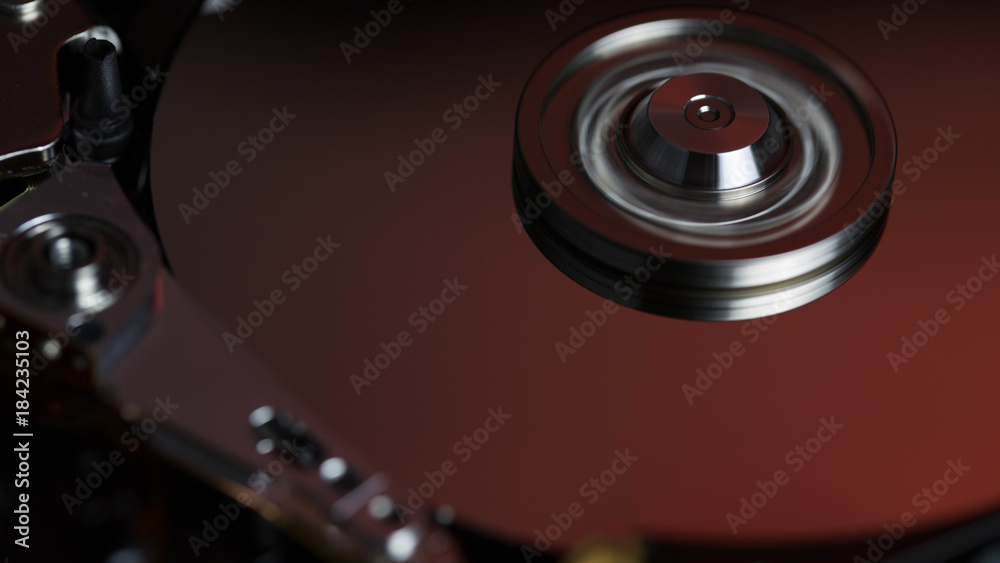 Disassembled hard drive from the computer, hdd with mirror effect Opened hard drive from the computer hdd with mirror effects Part of computer pc. Disassembled hard drive from the computer, hdd with mirror effect Opened hard drive from the computer hdd with mirror effects Part of computer pc.