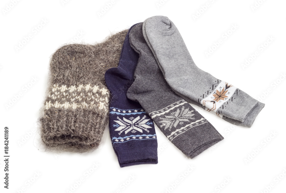 Different wool thermal socks on a white background
