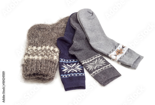 Different wool thermal socks on a white background