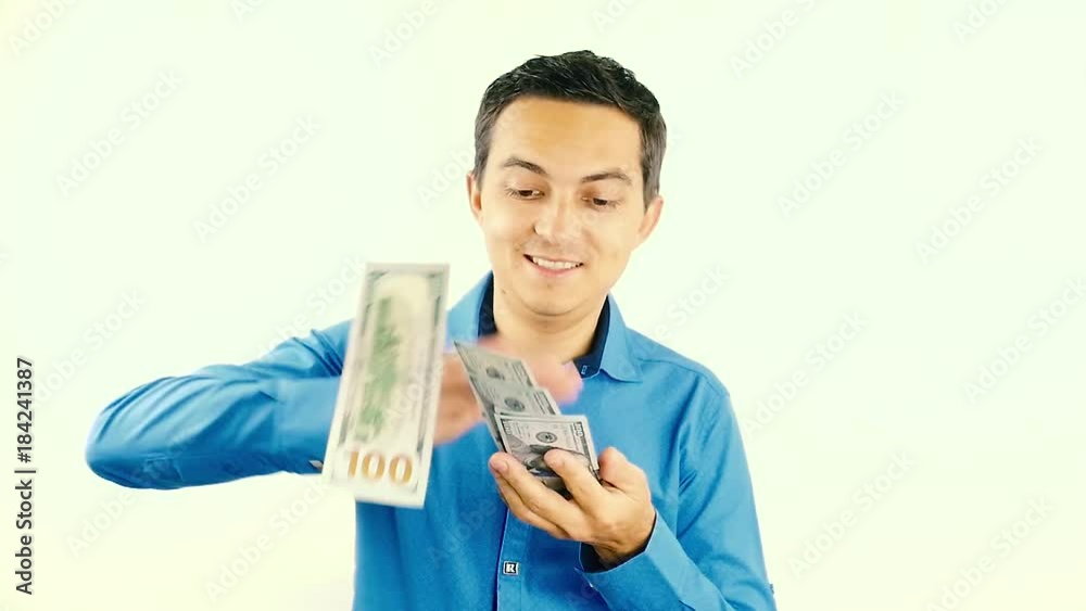 Slow motion of the guy rejoices and scatters dollars Slow motion of the guy rejoices and scatters dollars