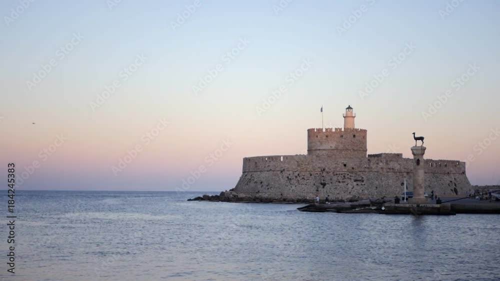The entrance to the harbor in Rhodes greece The entrance to the harbor in Rhodes greece