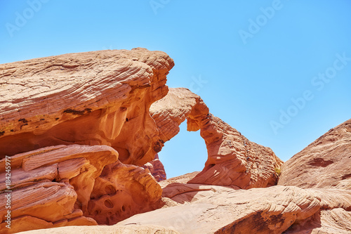 Sandstone arch formation, natural abstract background, Valley of Fire State Park, Nevada, USA. 