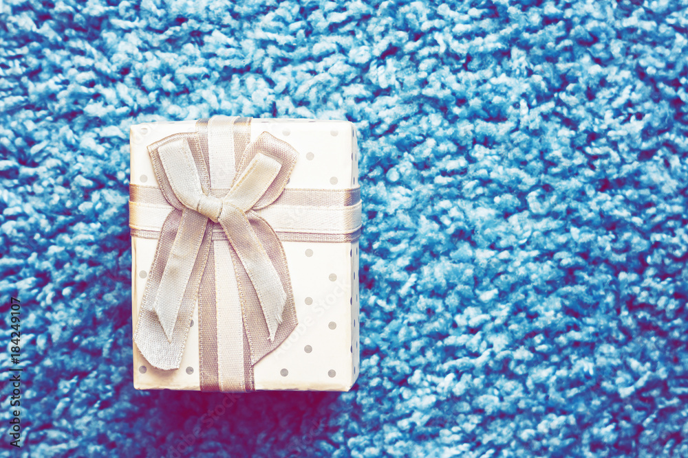 box with gift on blue background