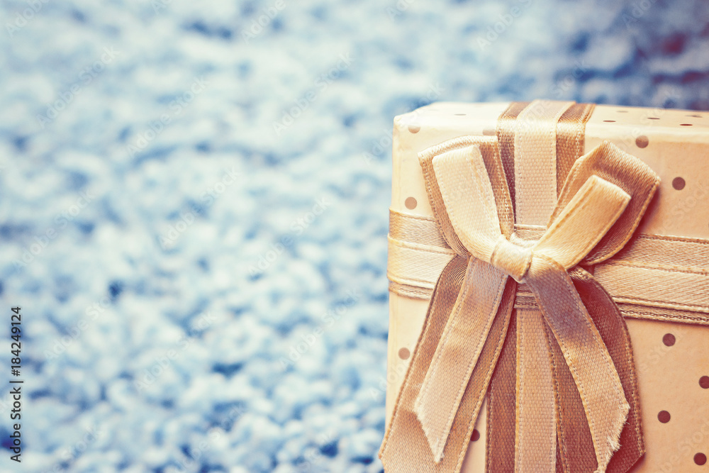 box with gift on blue background