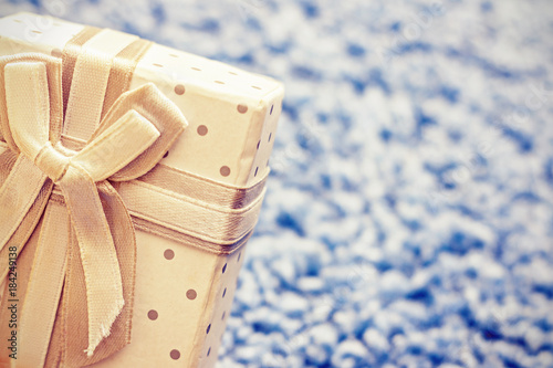 box with gift on blue background