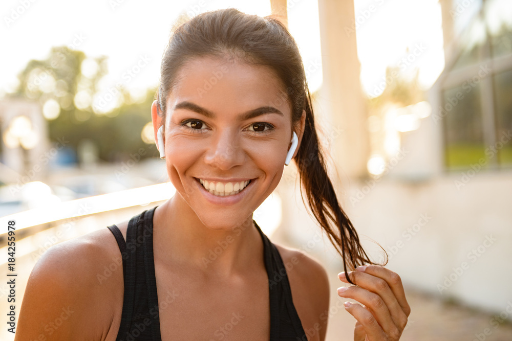Close up portrait of a smiling fitness woman Close up portrait of a smiling fitness woman