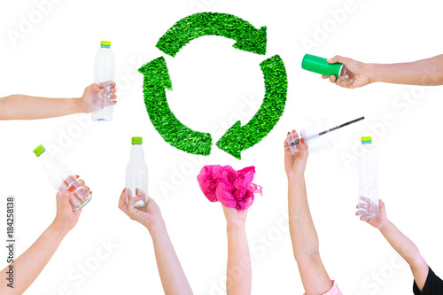 Hand hold show Recyclable Symbol plastic bottle a Green grass White background background 