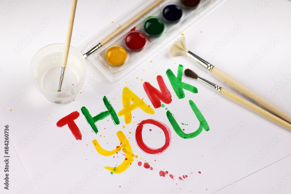 inscription on white sheet of paper with watercolors Thank you inscription on white sheet of paper with watercolors Thank you