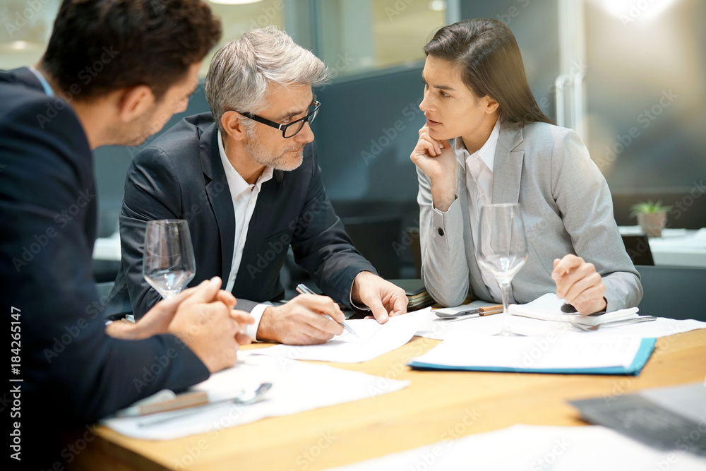 Executive people doing business report presentation in restaurant