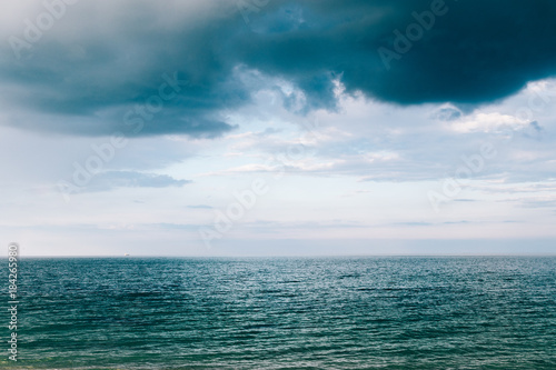 Sea and storm clouds