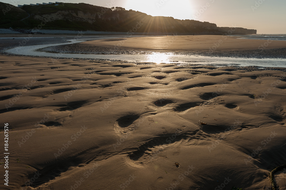 Sunset on Omaha Beach low tide Normandy France