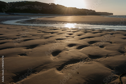 Sunset on Omaha Beach low tide Normandy France