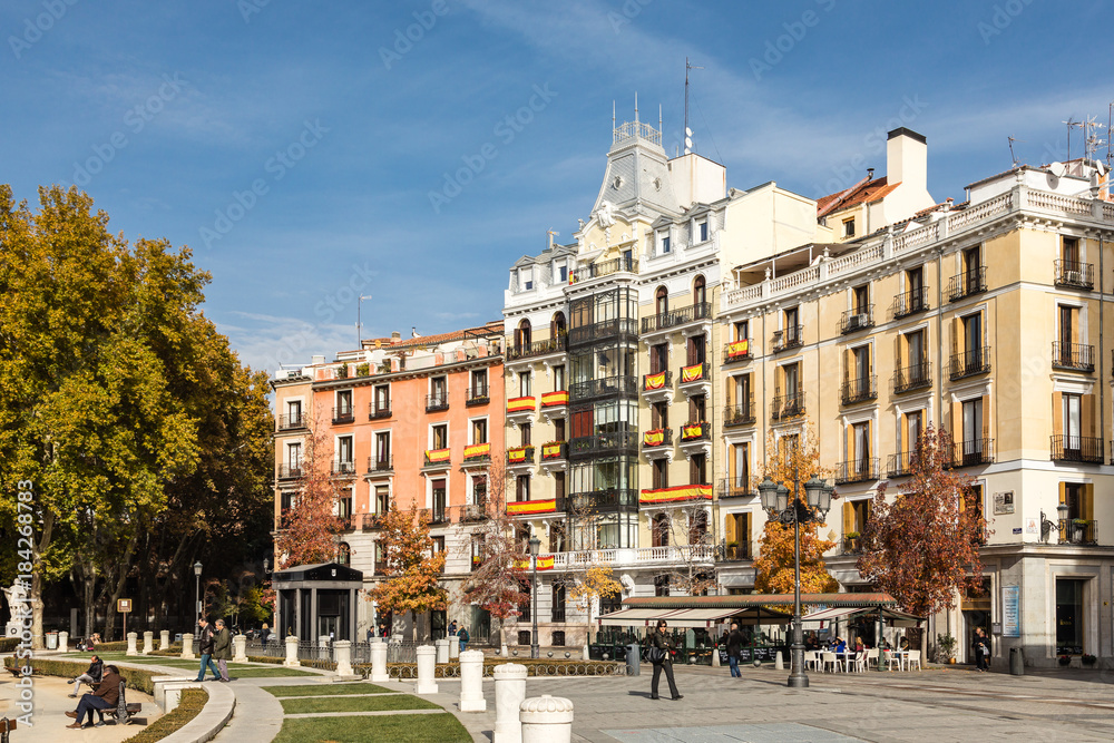 Plaza de Oriente in Madrid with Spanish flags hanging on its facades