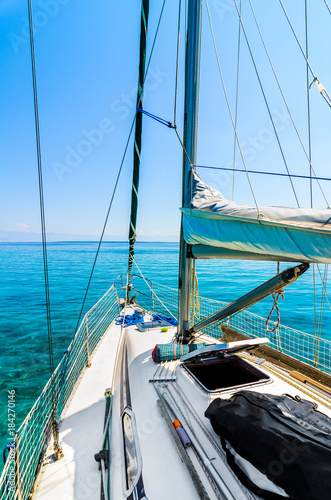 Front view of sailing boat on the sea.