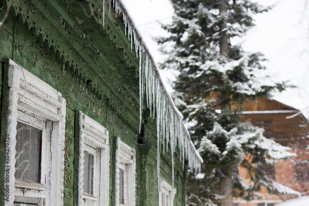 icicles on the roof of the house icicles on the roof of the house