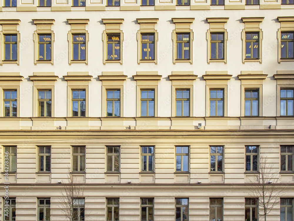 Obraz premium Facade with windows in the Soviet classicism style in Vilnius