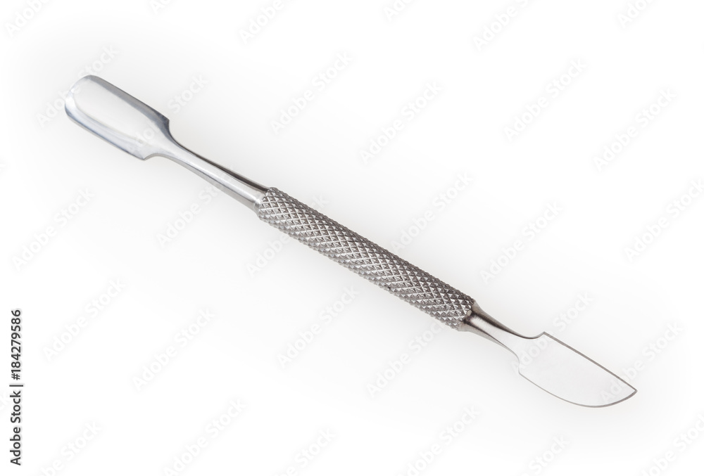 Fototapeta premium Steel manicure cuticle pusher isolated on white background with clipping path