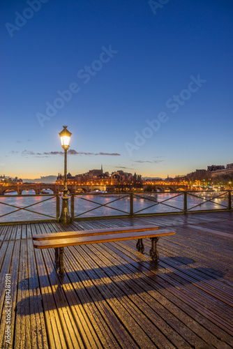 River Seine with Pont des Arts at sunrise in Paris