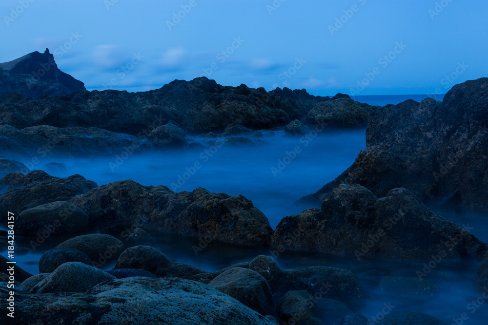 Powerful ocean waves offshore stone beach