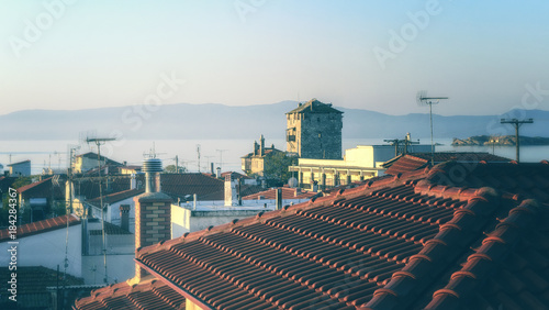 The roofs of Ouranopolis at dawn, Halkidiki, Greece photo