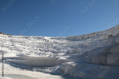 Beautiful landscape of the travertine pools and terraces in Pamukkale in Turkey 