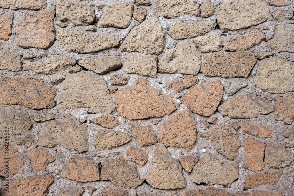 textured background of stone wall