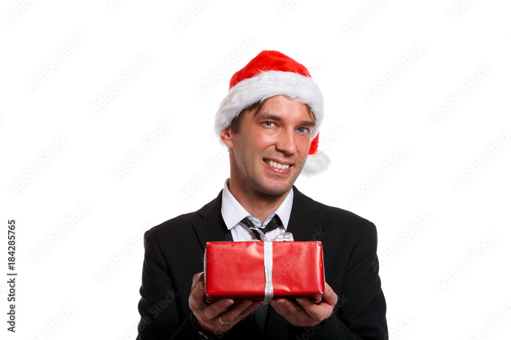 Portrait of happy guy in business suit,Santa cap Portrait of happy guy in business suit,Santa cap