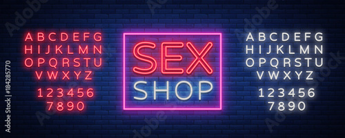 Sex shop logo, night sign in neon style. Neon sign, a symbol for sex shop promotion. Adult Store. Bright banner, nightly advertising. Vector Illustration. Editing text neon sign. Neon alphabet