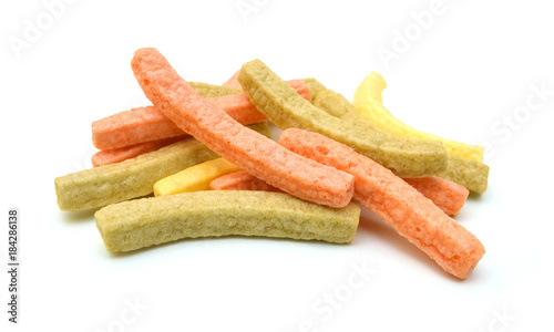 Принти на полотні Naturally Baked Veggie Straws Made From Tomatoes, Spinach and Potatoes on white