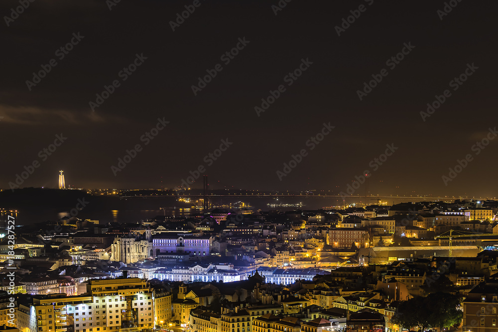 Panoramic view of Lisbon, Portugal in a misty night